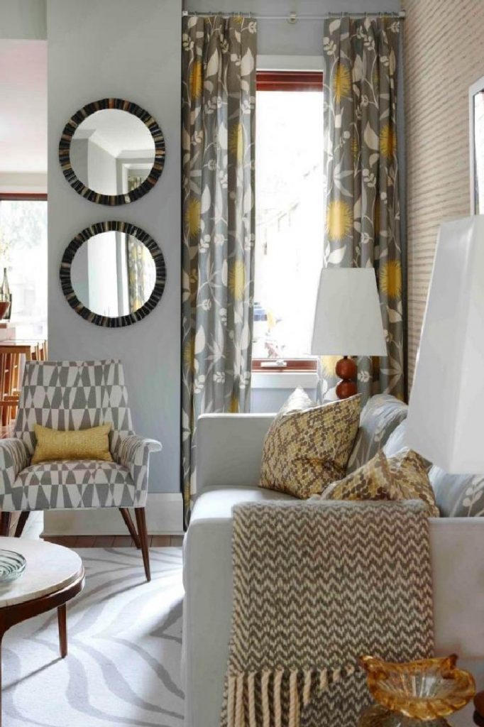 Sara Richardson created this sleek midcentury modern look by layering shades of gray, yellow and white
