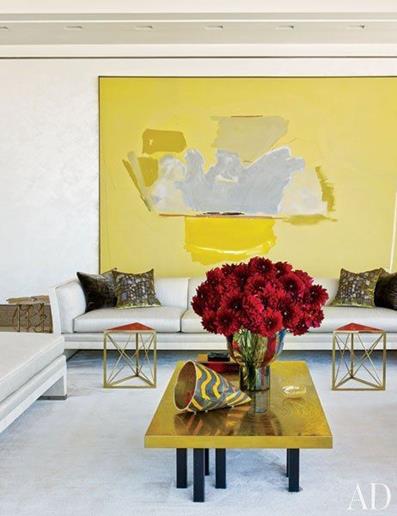 Manhattan modern living room design with gold coffee table by Rockwell Group