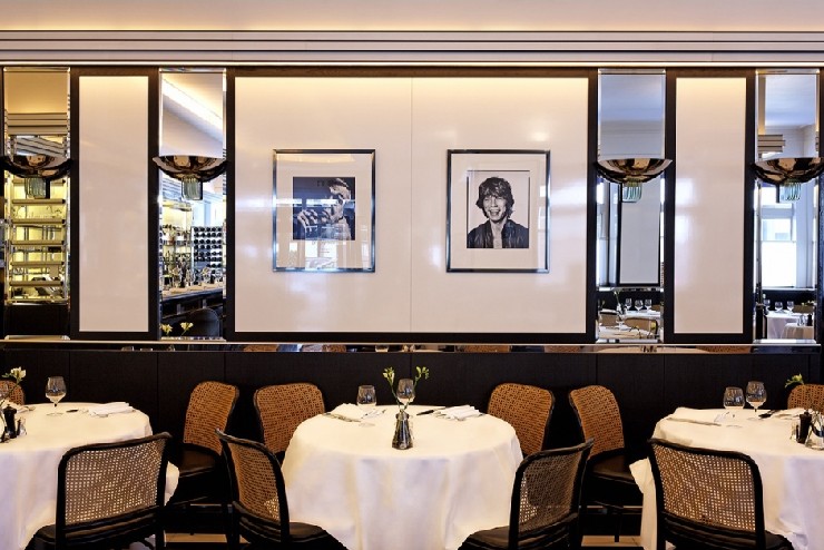 Le Caprice, London White Wall Paneling with Mirror details by Martin Brudnizki Design Studio
