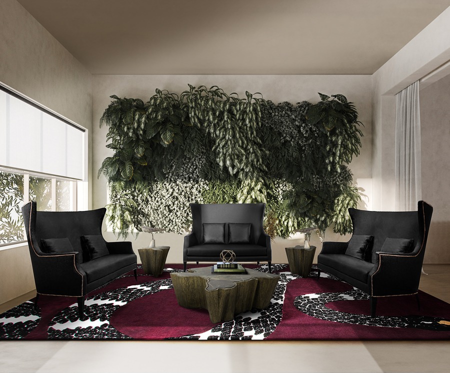 plant wall black sofa and armchairs