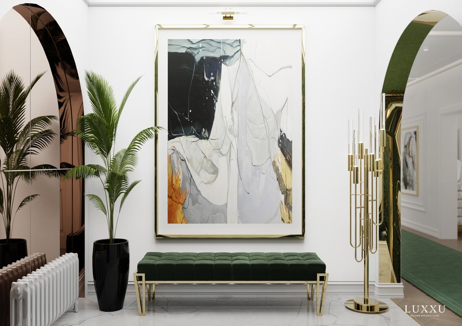 Parisian entryway green sofa and golden details