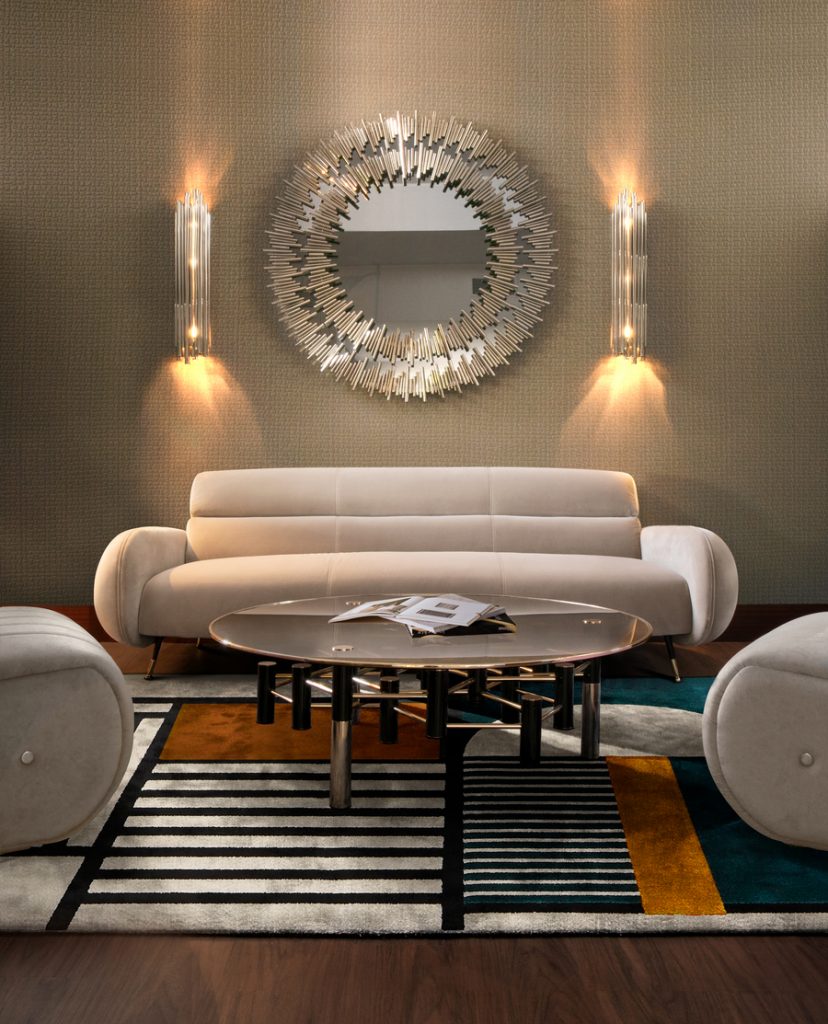 biege sofa with silver brass mirror and lights