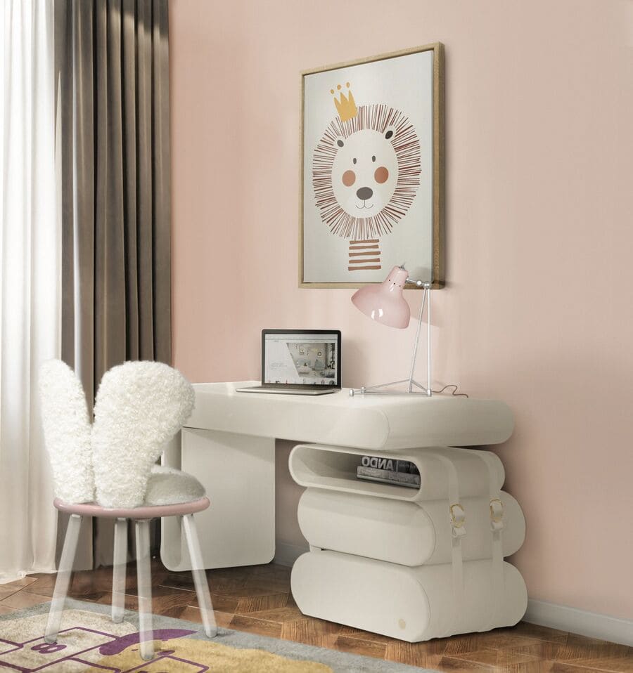 white chair and table in a pink wall kids bedroom