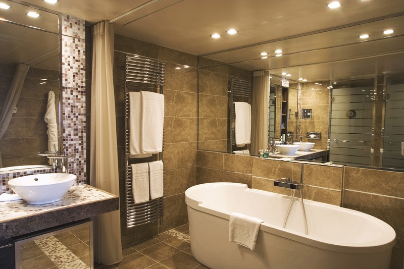 luxury bathroom and white bathtub designed by borella art design