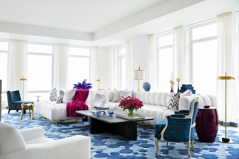 Drake/Anderson light tones with blue contrast rug and armchair