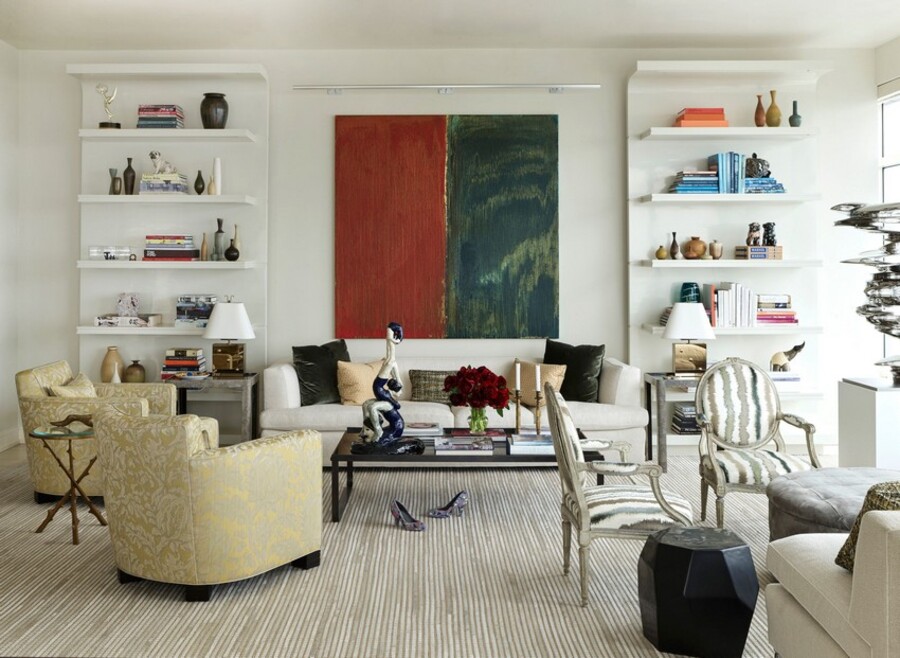 White walls living room furnitured in pastel tones